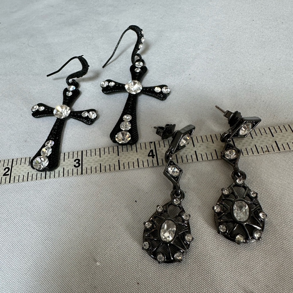 Two pair of black and crystal earrings cross and dangle